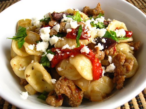 Pasta with Italian Sausage, Roasted Red Peppers, Olives and Goat Cheese