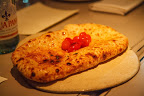 Flat Bread topped with Garlic Butter and Roasted Tomatoes