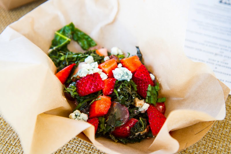 Kale and Strawberry Salad with Grapes, Candied Pecans, Blue Cheese and a Raspberry Vinaigrette