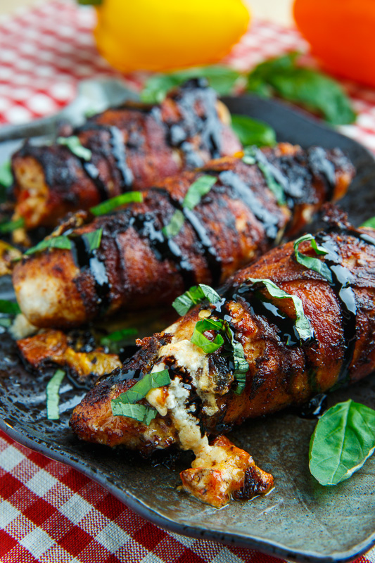 Bacon Wrapped Roasted Red Pepper and Goat Cheese Stuffed Chicken with Balsamic Drizzle and Basil