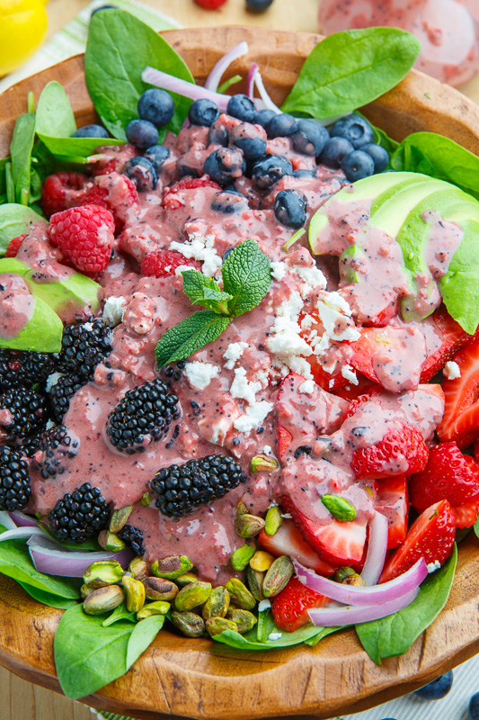 Berry and Avocado Spinach Salad with Feta and Pistachios in a Creamy Berry Poppy Seed Dressing