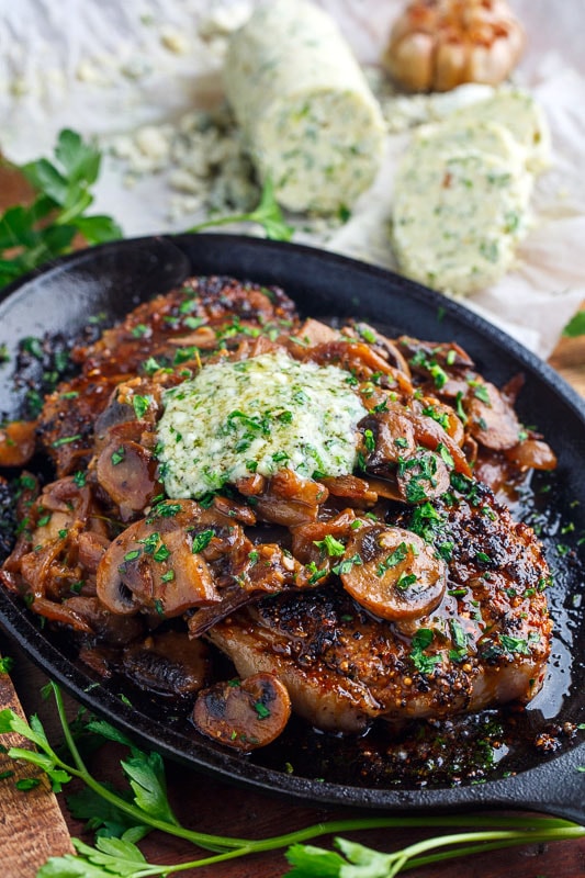 Pan Seared Steaks with Sauteed Mushrooms and Roasted Garlic Gorgonzola Butter